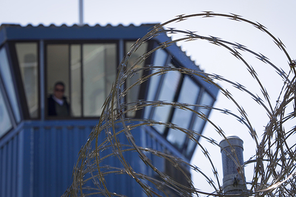 Concertina wire and a guard tower at Pelican Bay State Prison near Crescent City on Aug. 17, 2011. AP Photo/Rich Pedroncelli