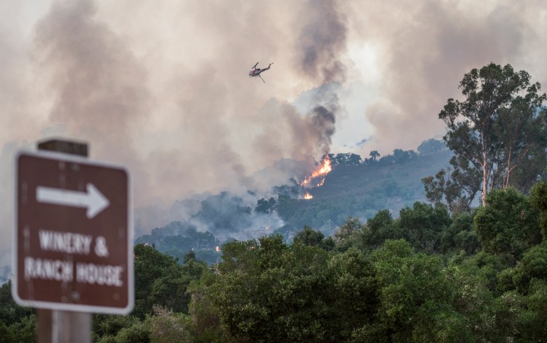 The Carmel Fire burns at the Georis Winery near Carmel Valley on Tuesday, Aug. 18, 2020. Photo by Nic Coury, AP Photo