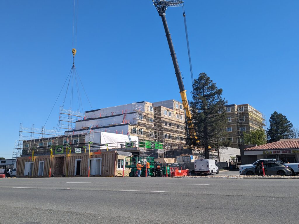 A six-story tall building under construction that will be 100% affordable housing that sits at 2350 S. Bascom Ave in San Jose along the city's border with Campbell.