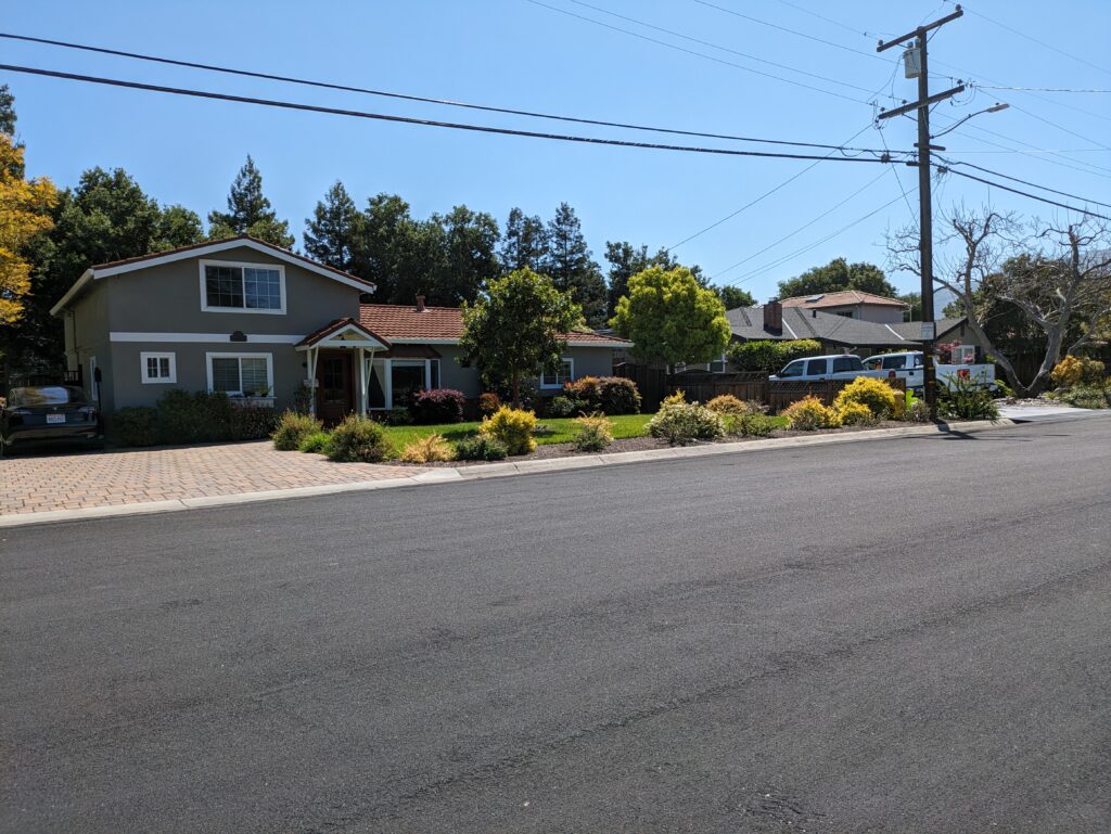 A two-story suburban house in Los Gatos on Benedict Lane which could be impacted by a potential seven-story housing development going through the preliminary application processes.